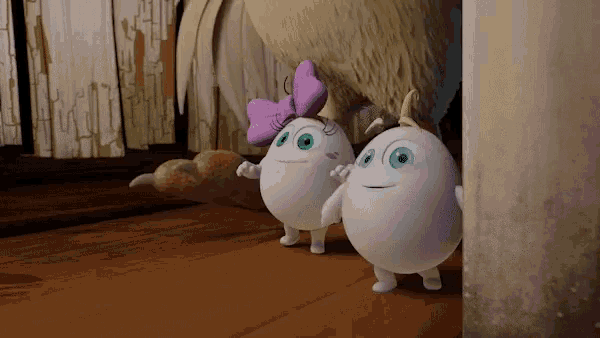 two cartoon eggs are standing next to each other