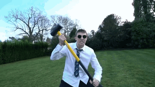 Playing With A Sledge Hammer Acting Silly GIF - Playing With A Sledge Hammer Hammer Sledge Hammer GIFs
