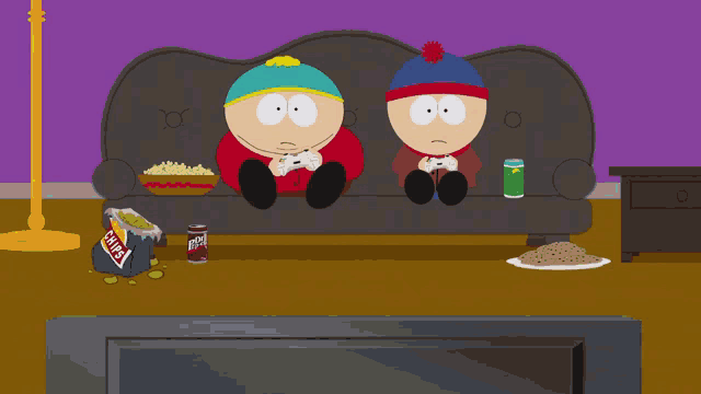 two south park characters are sitting on a couch playing a video game