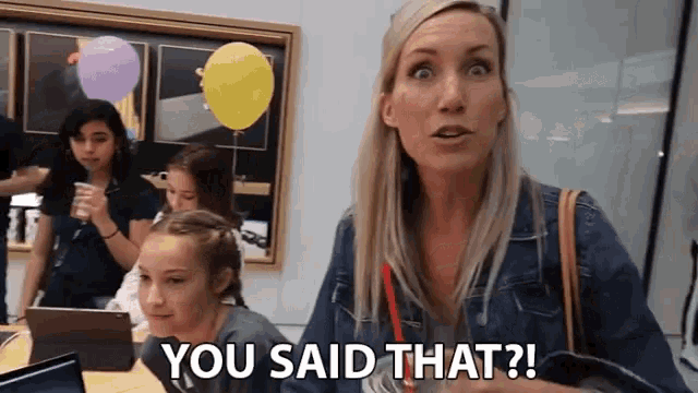 a woman says " you said that " in front of a group of children