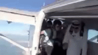 Guy Jumping From Plane City Explodes GIF - Guy Jumping From Plane City Explodes GIFs