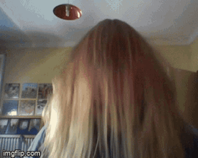 a close up of a woman 's head with imgflip.com at the bottom of the image