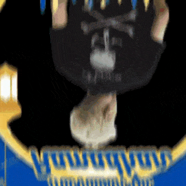 a blurry picture of a person with a skull on their back