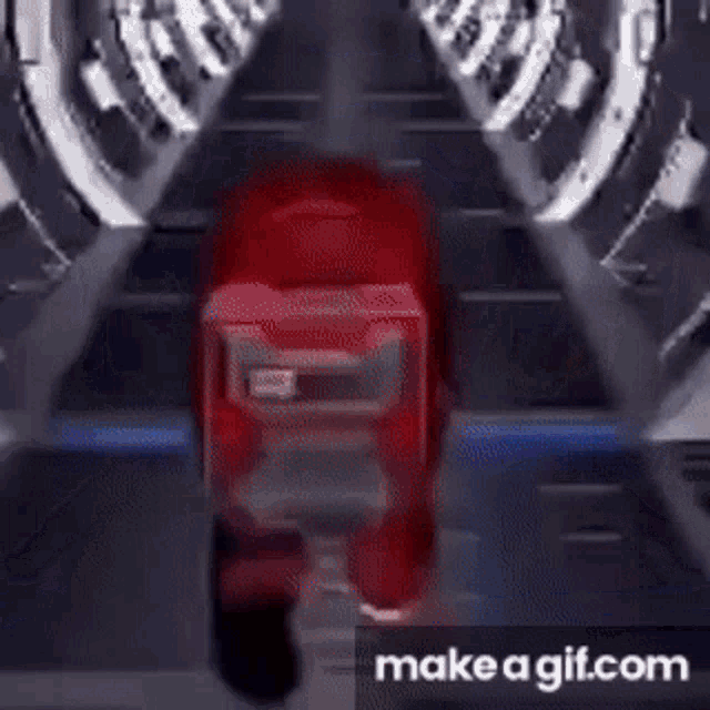 a red among us character is walking through a dark tunnel .