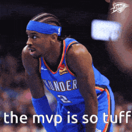 a man in a thunder jersey is kneeling down