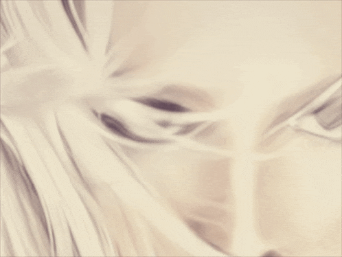 a close up of a woman 's face with her mouth open and her eyes closed
