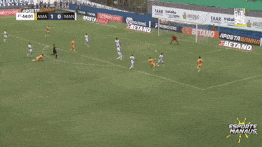 a soccer game is being played on a field with paybrokers advertisements