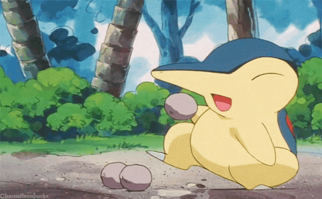 a cartoon of a yellow duck with a blue hat is playing with rocks