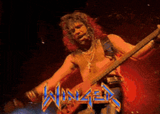 a shirtless man is playing a guitar in front of a sign that says ninja