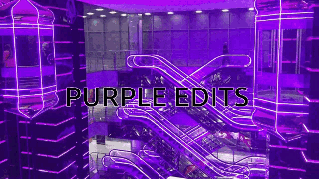 a purple escalator in a building with the words purple edits above it
