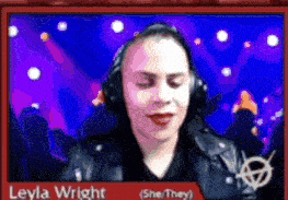 a picture of a woman wearing headphones with the name leyla wright