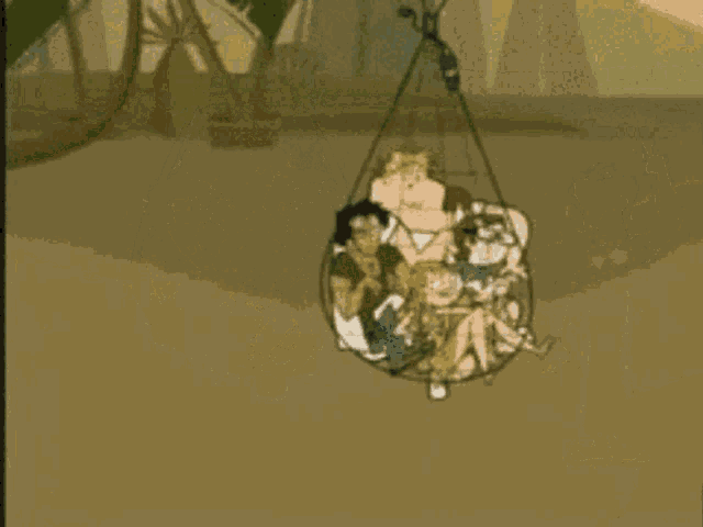 a cartoon character is flying through the air while holding a bow and arrow .