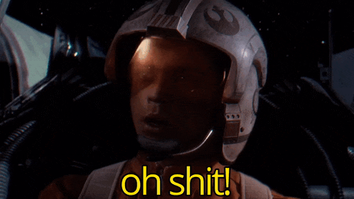 a man wearing a helmet says oh shit in yellow letters