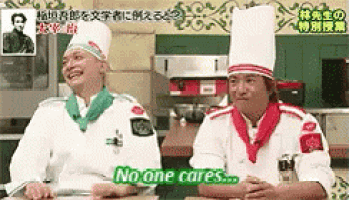 two chefs are sitting at a table and one of them says no one cares