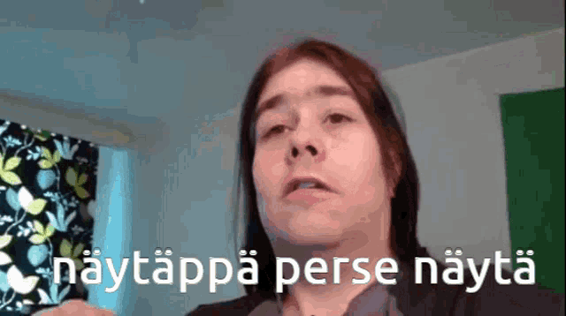 a woman is making a funny face with the words " naytappa perse nayta " behind her