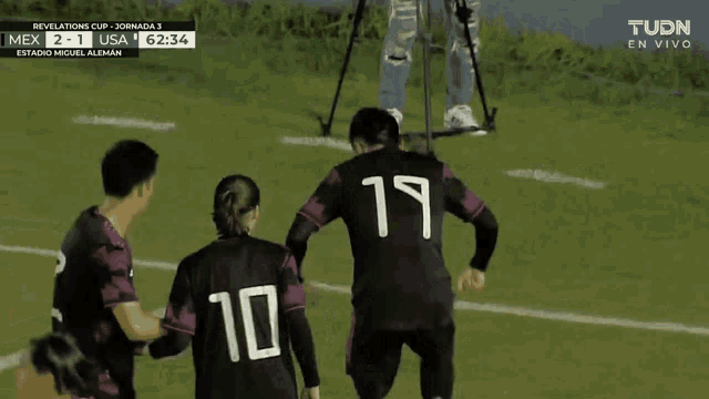a soccer player with the number 19 on their back