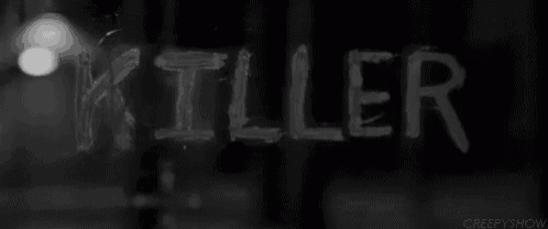 a black and white photo of the word killer written in white chalk