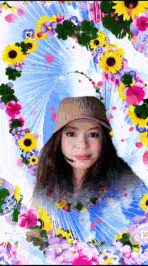 a girl in a hat is surrounded by flowers including a wreath of sunflowers