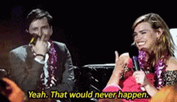 a man and a woman are sitting next to each other and the man is saying yeah that would never happen