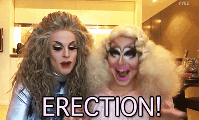 a couple of drag queens standing next to each other with the word erection in the foreground