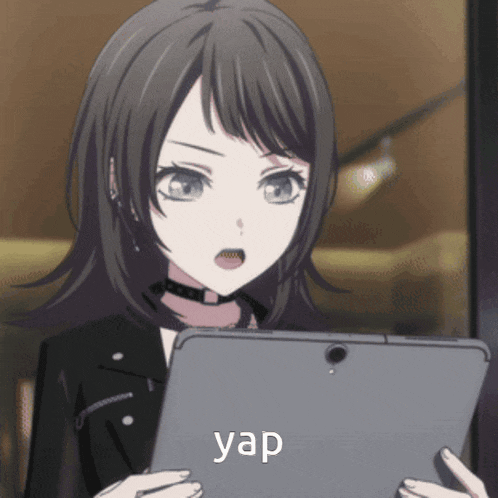 a girl with a choker is holding a tablet and says yap