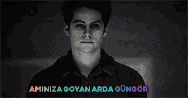 a black and white photo of a man with the words aminiza goyan arda gungor