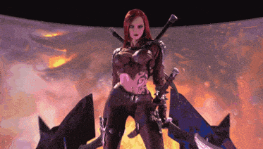a woman with red hair is holding two swords in front of a fire background