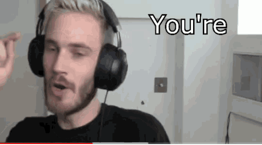 a man wearing headphones says you 're