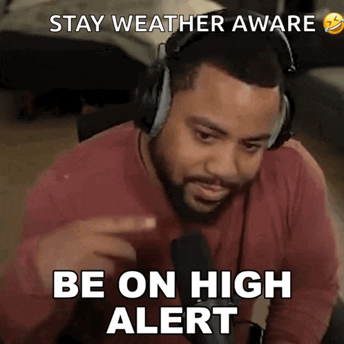 a man wearing headphones says to stay weather aware and be on high alert