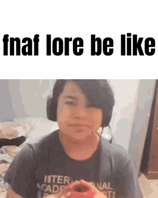 a young boy wearing headphones is holding a donut and says fnaf lore be like .