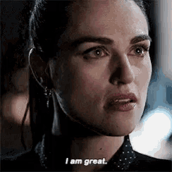 a close up of a woman 's face saying i am great .