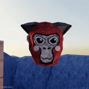 a red monkey mask with a cat ear is floating in the air