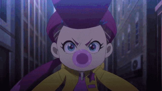 a purple circle with a circle in the middle is floating in the air .