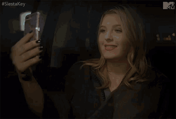 a woman taking a selfie with the words " i feel you " next to her