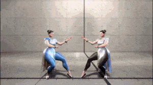 two female fighters are standing next to each other in a video game