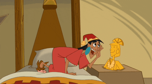 a cartoon character laying on a bed looking at a gold statue
