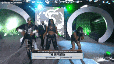 a group of people dancing on a stage with a sign that says " the infantry "