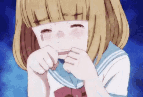 a girl with blonde hair is covering her face with her hands .