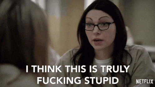 a woman wearing glasses says " i think this is truly fucking stupid " to another woman