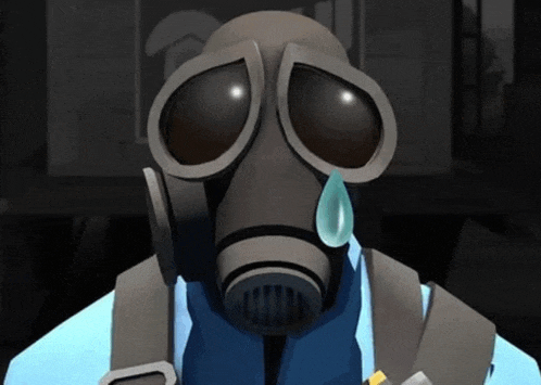 a person wearing a gas mask with a tear running down their face