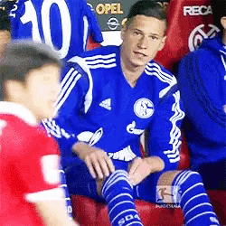 a soccer player with the number 10 on his shirt