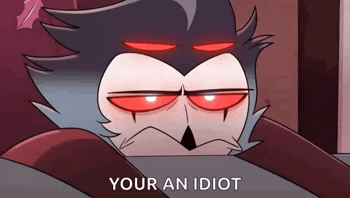 a cartoon character with red eyes and the words `` your an idiot '' written on it .