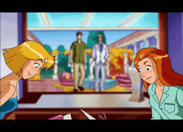 two cartoon characters looking at each other in front of a picture