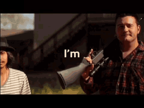 two men are standing next to each other and the word getting is displayed above them