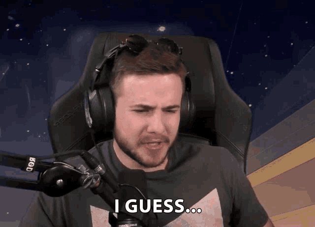 a man wearing headphones is saying i guess