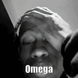 a black and white photo of a man covering his face with his hand and the words `` omega '' written on it .