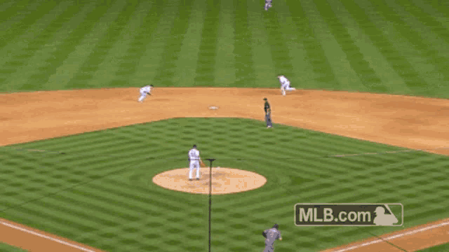 a baseball field with a mlb.com logo on the bottom