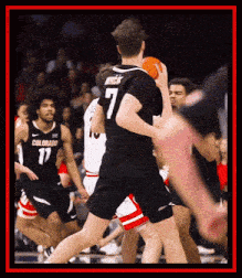 a basketball player with the number 7 on the back of his shirt