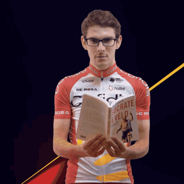 a man wearing a red and white jersey that says cofidis on it