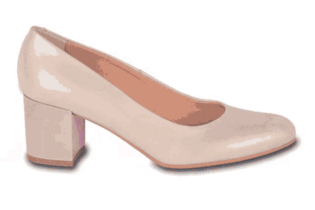 a pair of pink sandals with cork soles on a white background
